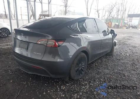 2023 Tesla Model Y Awd/Long Range Dual Motor All-Wheel Drive z USA, uszkodzony, nr VIN 7SAYGDEE3PA140727
